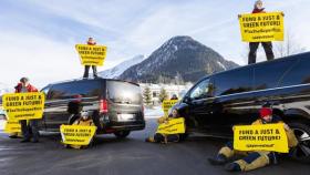 protesta Greenpeace a Davos